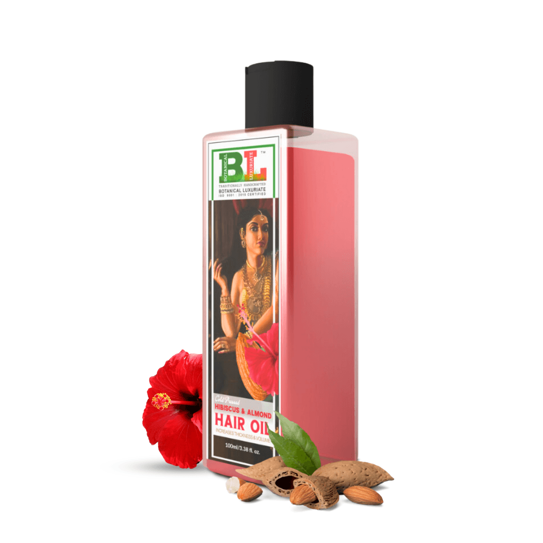 Botanical Luxuriate Cold Pressed Hibiscus & Almond Hair Thickness Oil bottle with hibiscus flower and almonds, promoting hair care.