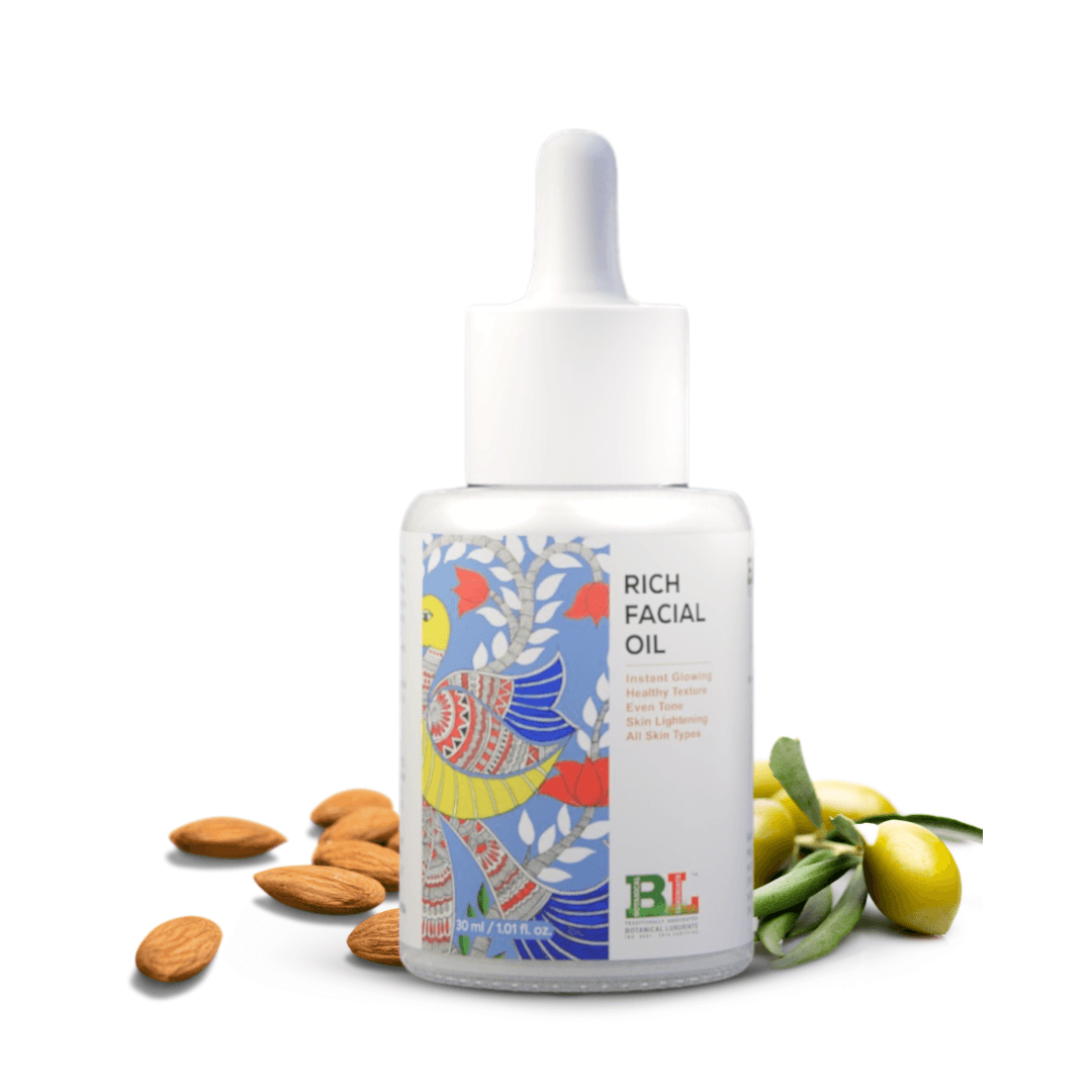 Botanical Luxuriate Rich Facial Oil 30ml bottle with a vibrant design, surrounded by almonds and olives, ideal for glowing skin.