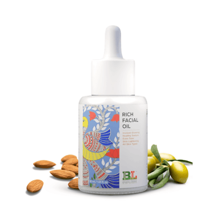 Botanical Luxuriate Rich Facial Oil 30ml bottle with a vibrant design, surrounded by almonds and olives, ideal for glowing skin.